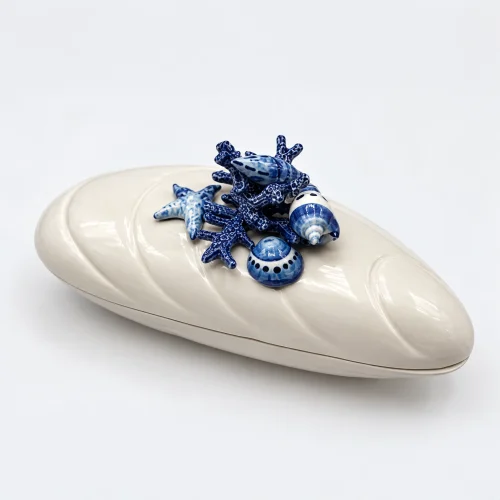 1a41d590-f55f-4b0e-b95a-83892b776153 copy Grote mossel terrine blauw koraal